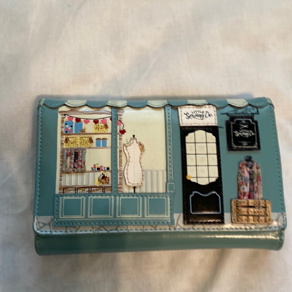 Vendula London tri fold wallet. Sewing theme.